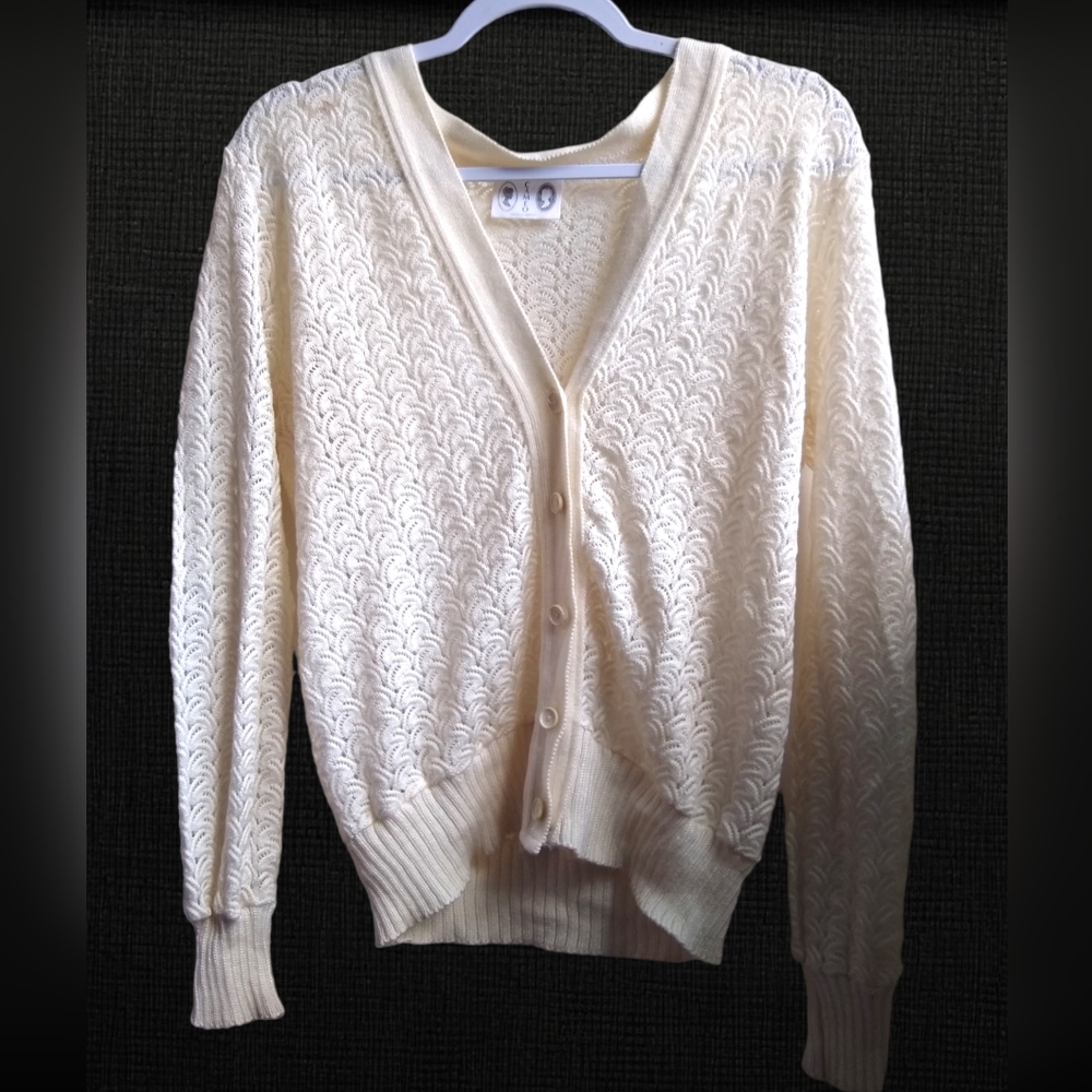 Top, Cardigan sweater, light weight White,kind of stretchy cloth. Net sweater